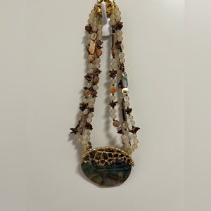 Unique necklace with large medallion